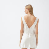 قميص قصير من الحرير باللون البيج