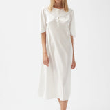 قميص سيلفيا الحريري باللون البيج