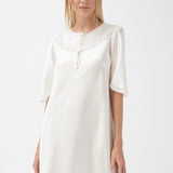 قميص سيلفيا الحريري باللون البيج